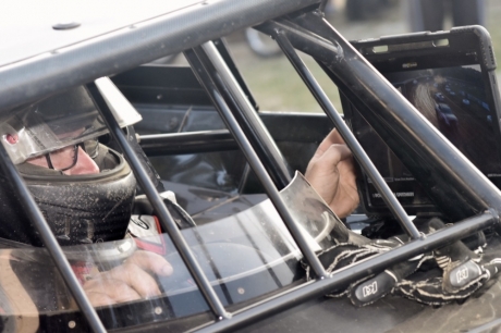 Brent Larson watches time trials on his tablet. (DirtonDirt)