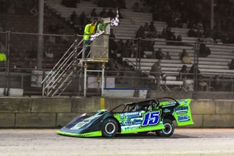 Nick Anvelink takes the checkers at Shawano. (Chad Marquardt)