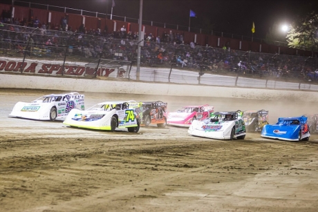 Ethan Dotson (74) leads at the outset of a semifeature. (Zach Yost)