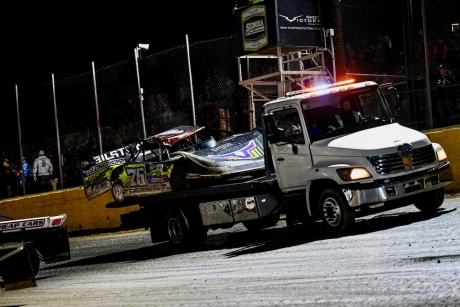 Brandon Overton's night ended with his car on a rollback. (Kevin Ritchie)