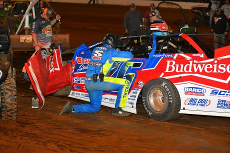 WoO official Matty Watkins checks on Brandon Overton. (mrmracing.net)