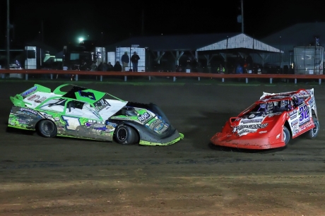Tyler Erb (1) spins in front of Bobby Pierce (32). (Josh James)