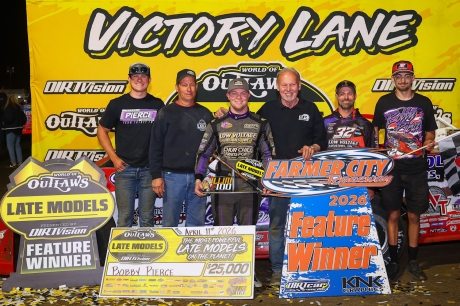 Bobby Pierce and his winning team in victory lane. (Josh James)