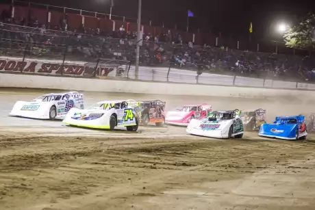 Ethan Dotson (74) leads at the outset of a semifeature. (Zach Yost)