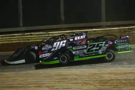 Tanner English (96) leads Jason Feger (25). (joshjamesartwork.com)