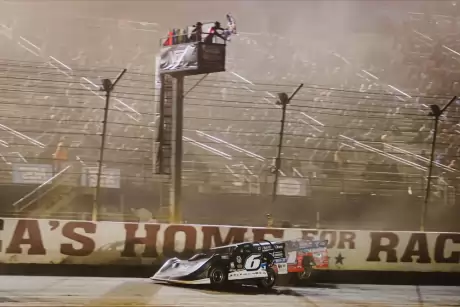 Hudson O'Neal (6) wins at the flagstand. (Zach Yost)