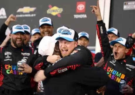 Team co-owner Michael Jordan hugs Daytona 500 winner Tyler Reddick. (James Gilbert/Getty Images)