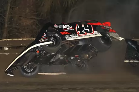Jonathan Davenport crashes on the opening lap. (Mike Ruefer)