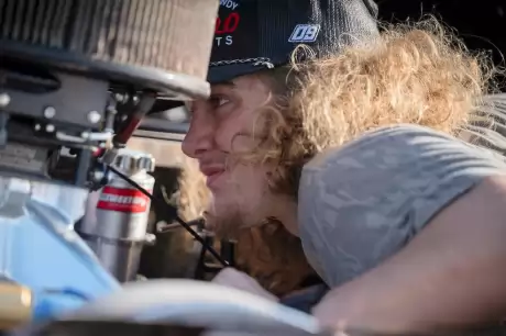 Hunter Cornell working under the hood. (Emily Schwanke/woolms.com)