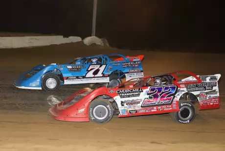 Hudson O'Neal (71) and Bobby Pierce (32) battle at Spoon River. (mikerueferphotos.photoreflect.com)