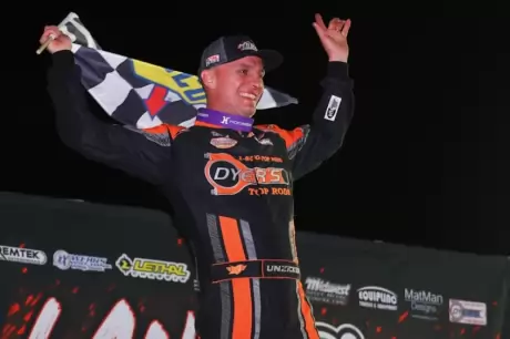 Ryan Unzicker celebrates at Fairbury. (joshjamesartwork.com)