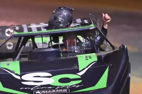 Jason Feger celebrates at Red Hill Raceway. (joshjamesartwork.com)