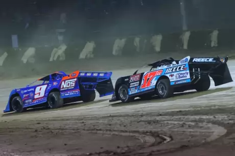 Nick Hoffman (9) and Dale McDowell (17m) run midpack during the Dream. (joshjamesartwork.com)