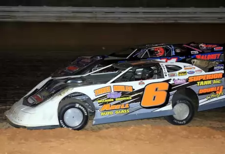 Jamie Lathroum (6) overtakes Rob Blair. (Clifford Dove)