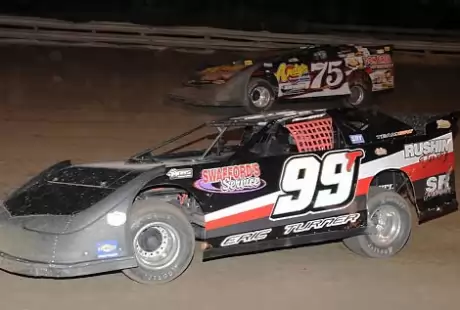 Terry Phillips (75) battles Eric Turner (99T). (fasttrackphotos.net)