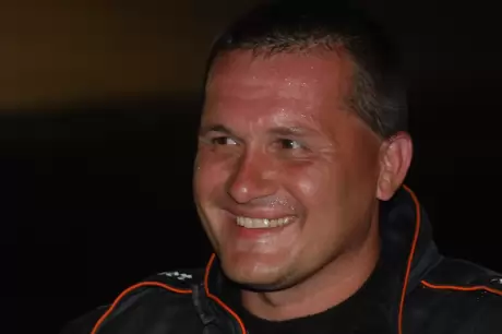Eddie Carrier Jr. had a big smile in victory lane at Brushcreek. (DirtonDirt.com)