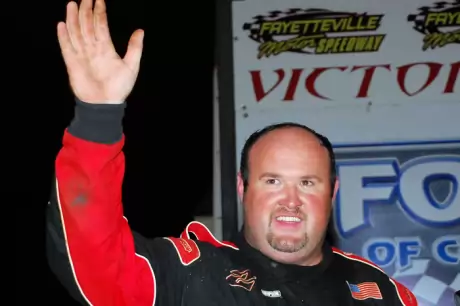 Winner Dennis Franklin waves to the Fayetteville crowd. (focusedonracing.com)