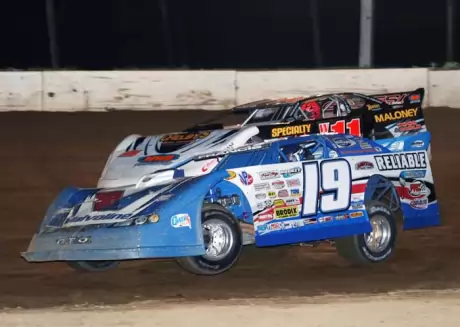 Francis (19) edges ahead of Robbie Blair. (Todd Battin)